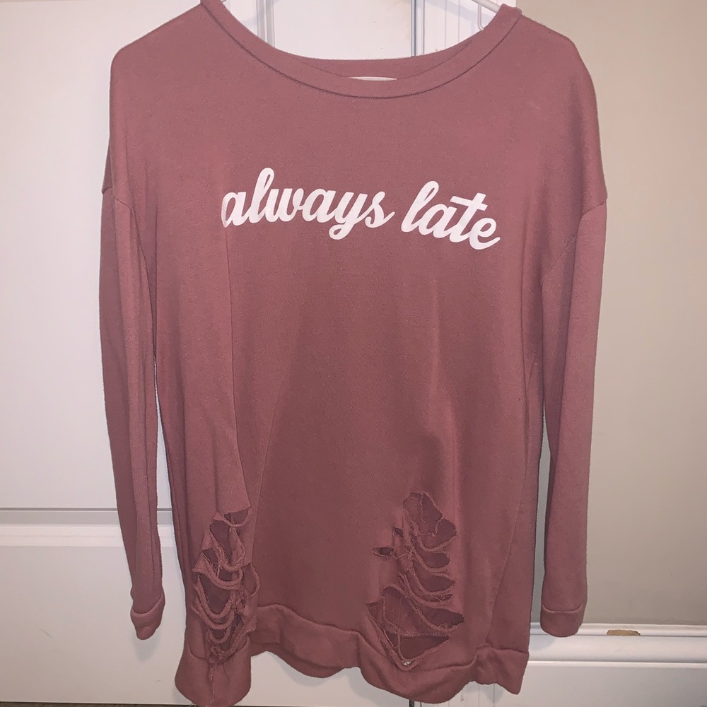 Distressed ‘always late’ sweater